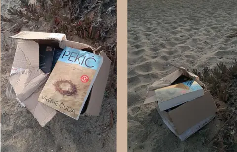 Mačak spašava knjige - slika 1